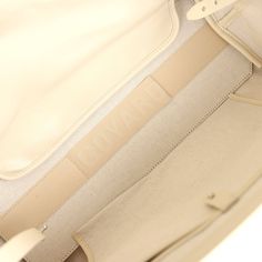 This 2024 Limited Edition Bellechasse Biaude PM bag is of sand Goyardine coated canvas and sand chevroches calfskin leather with palladium hardware, featuring two sand flat leather top handles and trim, a removable closure clip, and tonal stitching.The interior is lined in white natural canvas and has one interior floating pocket on the front wall.Origin: FranceCondition: New and never worn (plastic on handles)Accompanied by: Dustbag, closure clip and carebookMeasurements: 10.6" x 5.9" x 14.1"; Beige Rectangular Epsom Leather Shoulder Bag, Neutral Leather Bags With Leather Trim, Cream Shoulder Bag With Removable Pouch In Coated Canvas, Cream Epsom Leather Bag For Everyday Use, Cream Calf Leather Bag With Leather Lining, Neutral Leather Travel Bag, Designer Leather Bag In Neutral Color, Neutral Leather Bag With Leather Trim, Luxury Cream Shoulder Bag For Travel