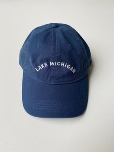 Designed by our own Frances Jaye team member, Tyler, this "Dad Hat" is a classic. The vintage denim color is sure to match every outfit all year round. Embroidered locally in Grand Rapids. Regular fit 100% Cotton Hand wash Casual Cotton Hat For Fall, Navy Casual Hat For Fall, Navy Casual Fall Hats, Cotton Hats For Everyday Fall Wear, Everyday Cotton Hats For Fall, Everyday Fall Cotton Hats, Fall Everyday Cotton Hats, Casual Fitted Baseball Cap With Flat Bill, Navy Cotton Hat With Short Brim