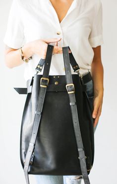 Large Black Leather Backpack | Leather Backpack Purse Leather Crossbody Bucket Bag For Travel, Chic Leather Backpack With Leather Handles, Black Leather Crossbody Backpack For Travel, Black Leather Backpack With Removable Pouch For Travel, Black Leather Tote Backpack With Adjustable Strap, Versatile Black Leather Backpack With Leather Handles, Black Leather Travel Backpack, Chic Black Leather Backpack For Travel, Chic Black Leather Tote Backpack