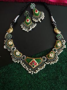 Antique silver replica necklace in Contemporary Look. Fusion Jewellery. Most demanding and liked necklace with beautiful color. Traditional Indian jewelry necklace. Add charm and charisma to your beautiful personality with these stunningly handcrafted silver look alike pendand necklace . Wear it with any of your formal or casual outfits and grab compliments all the way! Fusion Jewellery, Beautiful Personality, Traditional Indian Jewellery, Traditional Indian, Your Beautiful, Look Alike, Vintage Bags, Jewelry Necklace, Ring Bracelet