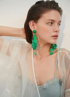 Be bold and make a statement with our Green Hoop Disc Drop Earrings! These striking earrings feature a big hoop design with a disc drop, adding a unique touch to any outfit. Perfect for confident women who want to add a daring touch to their style. 5 6/8" (14.5cm) drop 2 3/8" (6cm) width Post back Alloy, plastic Women's drop earrings Item #452802 Modern Jewelry For Spring Party, Modern Spring Party Jewelry, Chic Spring Party Hoop Earrings, Modern Metal Earrings For Spring, Chic Green Jewelry For Spring, Chic Green Spring Jewelry, Green Hoop Earrings For Summer Party, Trendy Dangle Hoop Earrings For Spring, Trendy Spring Dangle Hoop Earrings