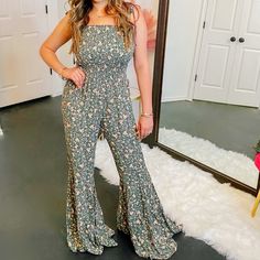 This Is Such A Gorgeous Green Floral Jumpsuit. It Comes With Adjustable Tie Spaghetti Straps. The Bottoms Of The Pants Are Loose And Wide And Sooo Gorgeous!! Fitted Strapless Floral Jumpsuit For Summer, Sleeveless Floral Print Jumpsuits, Sleeveless Non-stretch Floral Jumpsuits And Rompers, Casual Fitted Strapless Jumpsuit With Floral Print, Spring Floral Print Strapless Fitted Jumpsuit, Fitted Floral Print Strapless Jumpsuit, Glitter Romper, Olive Green Jumpsuit, Flowy Jumpsuit