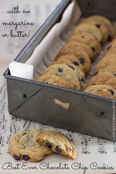 chocolate chip cookies are in a metal container