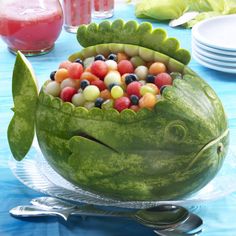 a watermelon shaped like a fish filled with candy