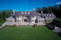 an aerial view of a large house with lots of windows