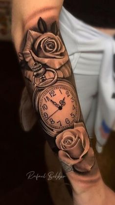 a person with a clock and roses tattoo on their arm is holding up a watch