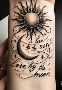 a sun and moon tattoo with the words live by the sun love by the moon