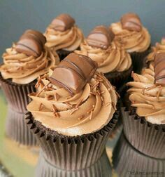 chocolate cupcakes with peanut butter frosting on top