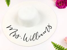 "Customize this hat with your own (future) last name! PRODUCT INFO: -Hat Material: Paper Straw -Head Circumference: 22.5 inches -Brim Width: 6 inches -Brim is easy to reshape -Packable and flexible -This listing is for custom Mrs. Text (font will be same as cover photo) ORDERING INFO: -When purchasing please leave in the \"notes to seller\" box: 1) date needed by 2)last name for the hat -If ordering Sequin Art please leave which you would like Ex: Flamingo, donut, seashell, martini, pineapple, s Adjustable White Hats For Graduation, Adjustable White Hat For Graduation, Customizable White Hat With Curved Brim, White Customizable Hat With Curved Brim, Customizable Curved Brim Hat For Vacation, Customizable White Beach Hats, Customizable Curved Brim Summer Hats, Sequin Art, Blank Hats