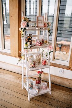 a white ladder with sweets in jars for DIY wedding decor at vault manor wedding in essex Diy Sweet Table Wedding, Candy Ladder Display, Diy Wedding Candy Bar, Wedding Sweet Station, Pick And Mix Wedding, Sweet Trolley Ideas, Sweet Station Wedding, Sweet Cart Diy, Candy Stand Ideas