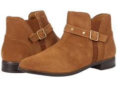 PRICES MAY VARY. A strap-and-buckle detail, soft leather upper, stacked heel, and welt stitching elevate this boot 1" heel height Soft synthetic outsole provides comfort all day Suede Boots With Buckle Closure For Work, Suede Workwear Boots With Buckle Closure, Casual Workwear Boots With Buckle Closure, Chelsea Boots Women, Boot Straps, Clarks Women's, Dark Khaki, Chelsea Boot, Suede Heels