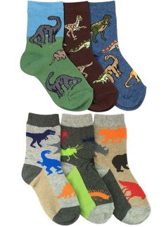 PRICES MAY VARY. Dinosaurs and land animals pattern crew socks Dinosaurs and land animals pattern crew socks Fun designs for all occasions Made with premium ultra soft cotton that is super comfortable Perfect for school, play, and everyday 6 pair pack with dinosaurs, insects, bears, lion, rhinos and fox This 6 pair pack comes with 3 pairs of dinosaur socks and 3 pairs of land animal socks. Made with premium ultra soft cotton. Super comfortable and stretch resistant cotton rich blend. Fun, colorf Alligator Socks, Crazy Socks Dinosaur, Kids Silly Socks, Dinosaur Socks, Cheap Novelty Socks With Character Print, Sock Animals, Sock Shop, Cute Socks, Patterned Socks