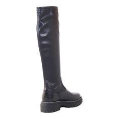 Elevate your fashion game with our sleek and sophisticated black knee-high lug sole boots. Designed to make a statement, these pull-on boots effortlessly combine style and comfort for a look that's both trendy and timeless. Pair these knee-high boots with your favorite skinny jeans for a casual look, or dress them up with a chic skirt or dress for a night out. The versatile design allows you to express your unique style effortlessly. Upper: Leather or suede Leather lining Pull on Heel Height: 1. Chic Skirt, Lug Sole Boots, Chic Skirts, Black Knees, Pull On Boots, Lug Sole, Tall Boots, Trinidad And Tobago, Knee High Boots