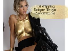 Make a statement at special events with a gold top rave outfit featuring a custom-fit handmade metallic bustier, blending steampunk and futuristic clothing for a unique Coachella look. This corset armor design ensures you stand out with style and edge. 🖤𝑪𝒖𝒔𝒕𝒐𝒎𝒊𝒛𝒂𝒕𝒊𝒐𝒏 We also offer customization. If you have a special color in mind or want to make small changes to the design, please send us a message to discuss your ideas. 🖤𝑯𝒐𝒘 𝒕𝒐 𝒐𝒓𝒅𝒆𝒓 1. Send your body measurements or just choose your size 2. Select color option 3. Select desired shipping method 4. Ships in 2-5 business days Your corset will closely resemble the photos, but the folds and details may vary, making each piece unique. Thank you for understanding and appreciating the uniqueness of your corset! 🖤𝒀𝒐𝒖 Corset Armor, Steampunk Futuristic, Futuristic Clothing, Coachella Looks, Armor Design, Rave Outfit, Overbust Corset, Corset Lingerie, Small Changes