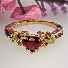 Heart-shaped Yellow Gold Diamond Ring With Center Stone, Classic Heart-shaped Ruby Ring For Formal Occasions, Gold Heart Ring With Center Stone For Valentine's Day, Luxury Yellow Gold Heart Ring With Gemstone, Heart Shaped Yellow Gold Jewelry With Center Stone, Ruby Heart Ring With Center Stone For Anniversary, Heart-shaped Yellow Gold Jewelry With Center Stone, Heart Cut Ruby Ring With Prong Setting For Anniversary, Anniversary Ruby Ring With Heart Cut And Prong Setting