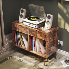 a record player is sitting on top of a wooden shelf