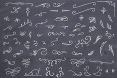 a chalkboard with different types of calligraphy written in white ink on black paper