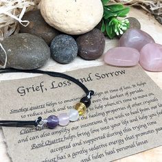 "(Gift wrap available at check out) If you need more than 1 gift wrap, please buy them separetly in my shop. You'll find the option under the section \"Gift Wrap\")  Add Grief Affirmation Cards  This grief and loss crystal bracelet is made up of Smoky Quartz, Citrine, Clear Quartz, Rose Quartz and Amethyst. All my crystals are natural in order to preserve all their qualities. These crystals have been chosen and put together based on their qualities to help and support for any kind of loss. About Spiritual Gemstone Bracelets As Gift, Spiritual Beaded Bracelets For Mother's Day Gift, Hand Wrapped Spiritual Crystals As Gift, Spiritual Adjustable Beaded Bracelets For Birthday Gift, Spiritual Hand-wrapped Crystals As Gift, Spiritual Hand-wrapped Beaded Bracelets As Gifts, Spiritual Hand-wrapped Bracelets As Gift, Spiritual Crystal Gemstone Bracelet Gift, Spiritual Gemstone Beads Crystal Bracelet Gift