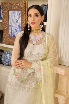 Beautiful eyecatching soft color Pakistani suit perfect for Eid, Features exquisitely pearls, Crystal & pure handwork thread embroidery all over the shirt and nicely embellished neckline with the lavishly detailed border along hanging unique style pearls tassels, Beautifully embroidered sleeves all work on Net fabric with high-quality inner. Dupatta: Pair with the contrast tie and dye embellished shimmer Net dupatta with four-sided hemline border along with hanging beads and pearls. Bottom: Pair Pakistani Suit For Eid, Latest Pakistani Dresses, Salwar Suits Party Wear, Pakistani Suit, Eid Outfits, Designer Suit, Eid Special, Hanging Beads, Sharara Suit