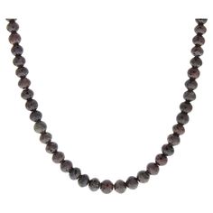 This necklace is a dramatic strand of 104 natural brown round diamonds totaling 102.28 carats. Slim in design and perfect for layering alongside other necklaces and chains, this brown diamond necklace is sure to get noticed. Fancy Sapphire, Faceted Bead Necklace, Tourmaline Beads, Tennis Necklace, Brown Diamond, Natural Brown, Yellow Diamond, Link Necklace, Round Brilliant Cut Diamond