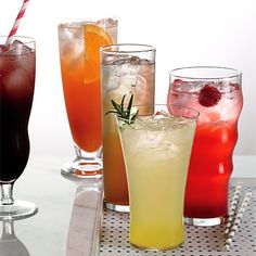 five different types of drinks on a table