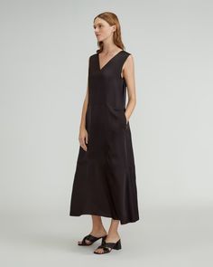 The Satin V-Neck Maxi Dress Black – Everlane Sleeveless Solid Color Bias Cut Dress, Sleeveless Solid Bias-cut Dress, Solid Sleeveless Bias Cut Dress, Sleeveless Solid Bias Cut Dress, Sleeveless Solid Dress With Bias Cut, Chic Unlined V-neck Maxi Dress, Chic Solid Color Bias Cut Maxi Dress, Bias Cut Maxi Dress For Daywear, Elegant Sleeveless Unlined Maxi Dress