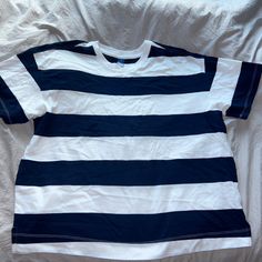 Navy Blue And White Striped Tee From Old Navy, Size M. Thicker Material Tee Shirt, Never Worn. Open To Offers! Casual Blue Shirt With Contrast Stripes, Blue Cotton Shirt With Contrast Stripes, Casual Blue Tops With Contrast Stripes, Navy Crew Neck Top With Contrast Stripes, Navy Short Sleeve Tops With Contrast Stripes, Navy Short Sleeve Top With Contrast Stripes, Blue Cotton Top With Contrast Stripes, Relaxed Fit Blue Tops With Contrast Stripes, Blue Relaxed Fit Tops With Contrast Stripes