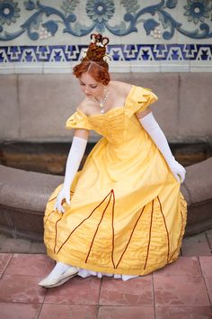 Yellow silk Biedermeier ballgown made after 1828 fashion plate. Will give an outstanding look at the ball or another dancing event, attracting as much attention to its owner, as possible. Bright like a sun, very light and of natural fabrics! The dress is made as one-part thing,the skirt is sewn to the bodice. It closes on back lacing. The bottom is decorated with silk ruffles and dark red velvet ribbons. The gown is designed to be worn wih period undergarnments, which are not included in listing Regency Victorian Dress For Debutante Ball, Regency Style Ball Gown With Fitted Bodice, Regency Style Ball Gown With Historical Design, Victorian Ball Gown For Debutante Ball, Regency Style Ball Gown Costume, Regency Style Ball Gown For Costume, Silk Ball Gown, Dark Red Velvet, Rococo Dress