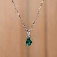 It is a lab emerald pendant, pear cut, measures 9x6 mm,about 1.27 carats The basic metal is sterling silver and plated with rhodium. To change the metal to a solid gold (white/rose) or platinum is also available, please ask for a quotation if you want. You can also go to my shop Home for more elegant rings:  https://www.etsy.com/shop/godjewelry?ref=hdr_shop_menu Emerald is birthstone of May More alexandrite rings: https://www.etsy.com/shop/godjewelry?ref=seller-platform-mcnav&section_id=20715043 Emerald Pendant Necklace Unique, Emerald Necklace Aesthetic, Silver Emerald Necklace, Emerald Necklace Silver, Emerald Pendant Design, Silver Pendant Necklace Unique, Alexandrite Rings, Emerald Pendants, Emerald Necklaces