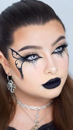 Dark Angel Face Paint, Black Fairy Makeup Halloween, Halloween Makeup Inspiration 2024, Dark Fairy Face Paint, Gothic Butterfly Makeup, Witch Fairy Makeup, Halloween Fairy Makeup Looks, Dramatic Fairy Makeup, Spooky Fairy Makeup