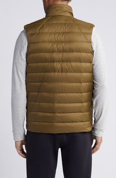 Whether you're deep in the backcountry or just your own backyard, you'll appreciate the cozy core warmth of this vest filled with 750-fill-power down. 26 1/2" length (size Medium) Front zip closure Stand collar Front zip pockets; interior chest zip pocket Durable water-repellent (DWR) finish Packs into pocket Lined, with 750-fill-power down 100% recycled polyamide Machine wash, tumble dry Imported Certified to the Responsible Down Standard (RDS) by Control Union Sleeveless Down Puffer Vest, Outdoor Puffer Vest Jacket Sleeveless, Outdoor Puffer Vest With Down Filling, Outdoor Down Puffer Vest, Outdoor Puffer Vest Made Of Down, Sleeveless Down Puffer Jacket, Nylon Puffer Vest For Outdoor, Outdoor Nylon Puffer Vest, Reigning Champ