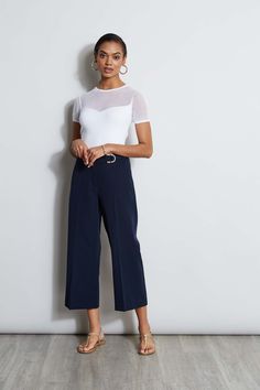 Springs "IT" pant is a chic update to the relaxed wide leg pant. We're obsessed with its cropped length, higher waist silhouette with graphic D-ring belt. Wear it with a knit or layered with a blazer, it will become a favorite in your wardrobe. T-Tahari Crepe Wide Leg Cropped Pant with D-Ring Belt Detail Runs true to Size Model is 5'9" and wearing size 2 Dry Clean Only Imported Style #: THF44003 Wide Leg Twill Pants Outfit, Clean Work Outfits, Cropped Wide Leg Trousers Outfit, Wide Leg Cropped Pants Outfit, Cropped Wide Leg Pants Outfit, Cropped Pants Outfit, Wide Leg Trousers Outfit, Professional Pants, Work Capsule