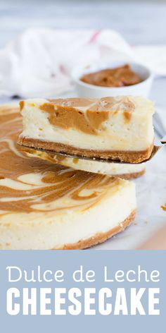 two pieces of cheesecake sitting on top of each other with sauce in the background