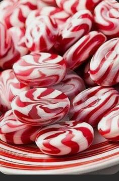 red and white candy canes on a plate