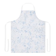 a white and blue apron with flowers on it