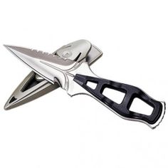 a knife shaped like a scissor on a white background