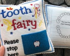 two tooth fairy pillows with writing on them and a hand holding the pillow that says tooth fairy