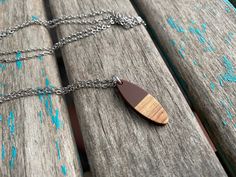 This lovely necklace is the perfect gift for anyone, or for yourself! The wood and brown acrylic pendant measures just over 1 in length. The pendant is strung on your choice of chain. READ BELOW FOR ANSWERS TO COMMONLY ASKED QUESTIONS: Q: Can I include a note in the package so that I can send it directly as a gift? A: Absolutely, it's no problem at all to include a short note for you in the package. Just type me a quick note during checkout of what you want the note to say. Q: If I place an orde Brown Wooden Necklace Gift, Brown Wooden Necklace For Gifts, Brown Wooden Necklace For Gift, Brown Wood Necklace As Gift, Brown Wooden Necklace Perfect For Gifts, Lovely Necklace, Pretty Earrings, Copper Earrings, Acrylic Earrings