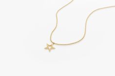 Gold KT: 14K Charm 10mm x 10mm The delicate gold chain holds a beautifully crafted star charm, symbolizing hope and good fortune. Measuring approximately 10 x 10 mm in size, this necklace is the perfect size for everyday wear. Whether you're looking for a special gift for a loved one or simply treating yourself to a beautiful piece of jewelry, this lucky star charm necklace is a timeless and meaningful choice. Star Necklace Gold Thick Chain, Yellow Gold Star Charm Pendant Necklace, Yellow Gold Everyday Charm Necklace With Star Charm, Elegant Star Charm Necklace, Tarnish Resistant, Elegant Star-shaped Tarnish Resistant Charm Necklace, Everyday Yellow Gold Charm Necklace With Star, Everyday Yellow Gold Necklace With Star Charm, Yellow Gold Star Of David Necklace With Delicate Chain, Yellow Gold Charm Necklace With Star Of David Charm