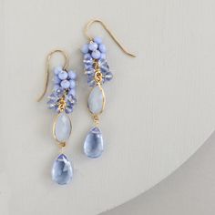 Free Shipping. Long gemstone drop earrings made with a dark blue chalcedony bezel and sky blue quartz gemstones. Gemstone earrings are a perfect jewelry gift for her, gift for mom or birthday gift. Parken Jewelry. Bridesmaids Outfits, Gemstone Earrings Gold, Gemstone Drop Earrings, Peridot Earrings, Unique Nature, Blue Quartz, Blue Chalcedony, Cluster Earrings, Drop Earring