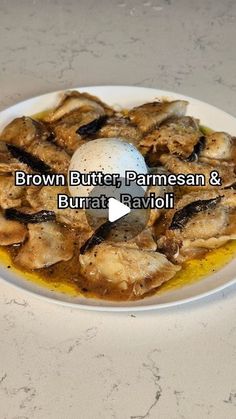 brown butter, parmesan and burnt ravioli on a plate with an egg