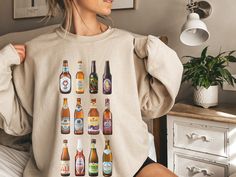 ✺Beer Sweatshirt✺ A great quality and comfy sweatshirt bound to keep you warm in the colder months. A pre-shrunk, classic fit sweater that's made with air-jet spun yarn for a soft feel and reduced pilling. This sweatshirt is very soft and coming from someone who has sensory issues, this does not cause any itchiness or annoyance.  * QUICKFACTS * ✺ 50% Cotton 50% Polyester ✺ Medium-heavy fabric ✺ Our sweatshirts are unisex sizing (looser fit for women).  ✺Please see images for measurements. Please Beer Sweatshirt, Beer Hoodie, Digital Printing Machine, Gifts For Beer Lovers, Sensory Issues, Beer Shirts, Comfy Sweatshirt, Beer Lovers, Fitted Sweater