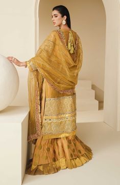 Gold Chanderi Palazzo Set With Pallu, Yellow Embroidered Chinon Palazzo Set, Embroidered Gold Palazzo Set With Traditional Drape, Gold Embroidered Palazzo Set For Transitional Season, Eid Sharara Set With Art Silk Dupatta, Eid Sharara In Art Silk With Dupatta, Eid Sharara With Dupatta In Art Silk, Embroidered Gold Palazzo Set For Eid, Yellow Sharara With Dabka And Traditional Drape