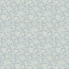 a blue and white wallpaper with floral designs