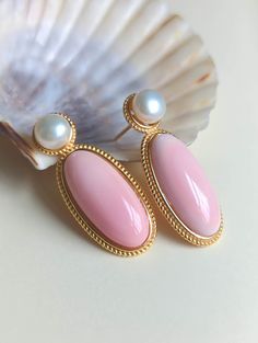 Please check shop announcement for order processing time in August. Vintage mid century style statement post this pair of earrings are made with queen conch,  genuine freshwater pearls and all solid s925 silver.  Overall measurement:  13.5 x 33.5 mm.   Metal: genuine gold plated solid S925 silver. Pearl size: 6.5-7mm Elegant Cabochon Pearl Drop Earrings, Conch Earrings, Conch Pearl, Conch Earring, Pearl Size, Style Statement, Mid Century Style, Conch, Pretty Things