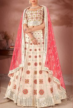 This exquisite Multicolour Lehenga Choli is crafted with premium Georgette and Raw Silk, ensuring a luxurious and high-quality piece. With its stunning design and materials, this dress offers a sophisticated and elegant look for any occasion. Elevate your wardrobe with this must-have piece. LEHENGA FABRIC: Premium Georgette, Premium Net BLOUSE FABRIC: Premium Georgette, Premium Raw Silk DUPATTA: Net SIZING: Can be stitched upto 42 inches bust and waist SHIPPING: The product will be shipped withi White Lehenga Choli, Heavy Lehenga, White Lehenga, Raw Silk Lehenga, Georgette Lehenga, Party Wear Lehenga Choli, Net Blouses, Lehenga Online, Lehenga Choli Online