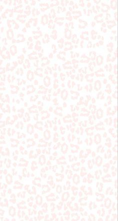 a white and pink leopard print wallpaper with an animal pattern on the bottom right corner