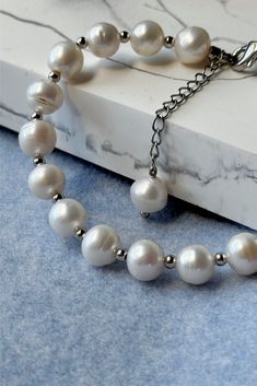 Freshwater pearl bracelet in silver tone beads cottagecore white jewelry by MarinaMiJewelry. Pearl necklace Coquette Old Money Aesthetiс | Gift for her. Accentuate your style with our freshwater pearl bracelet, adorned with silver tone beads, embodying the charm of cottagecore white jewelry. This pearl bracelet, inspired by Coquette Old Money Aesthetic, makes for a delightful and timeless gift for her, adding an elegant touch to any occasion. Everyday Silver Beaded Bracelet With Pearl Charm, Silver Pearl Chain Bracelet For Everyday, Everyday Silver Pearl Chain Bracelet, Silver Baroque Pearl Bracelet With Pearl Chain, Minimalist Silver Beaded Bracelet With Pearl Charm, Minimalist Silver Beaded Bracelets With Pearl Charm, Silver Pearl Beaded Bracelets Minimalist Style, Silver Baroque Pearl Bracelets With Round Beads, Minimalist Silver Pearl Beaded Bracelets