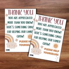 two thank you cards with rainbows and clouds on the front, one is for someone