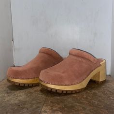 Here Is A Nwot Pair Of Cute Wooden Based Clogs . Suede Upper , Padded Around The Upper Aggressive Tread. Any ?? Just Ask Casual Suede Clogs With Wooden Heel, Casual Suede Clogs With Block Heel, Comfortable Clogs With Stacked Heel And Round Toe, Casual Suede Clogs With Reinforced Heel, Medium Width Slip-on Clogs With Reinforced Heel, Comfortable Clogs With Wooden Heel And Round Toe, Suede Clogs With Wooden Heel And Round Toe, Comfortable Slip-on Clogs In Medium Width, Comfortable Slip-on Clogs Medium Width